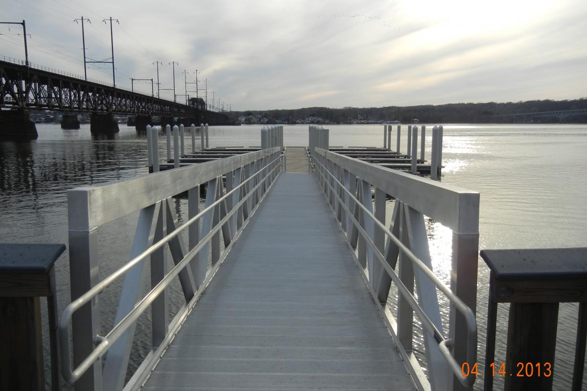 Photo looking down Lower Ferry Pier, with railings on both sides